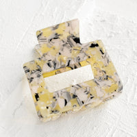 Lemon Candy Marble: A marbled hair clip in yellow and pink marble.