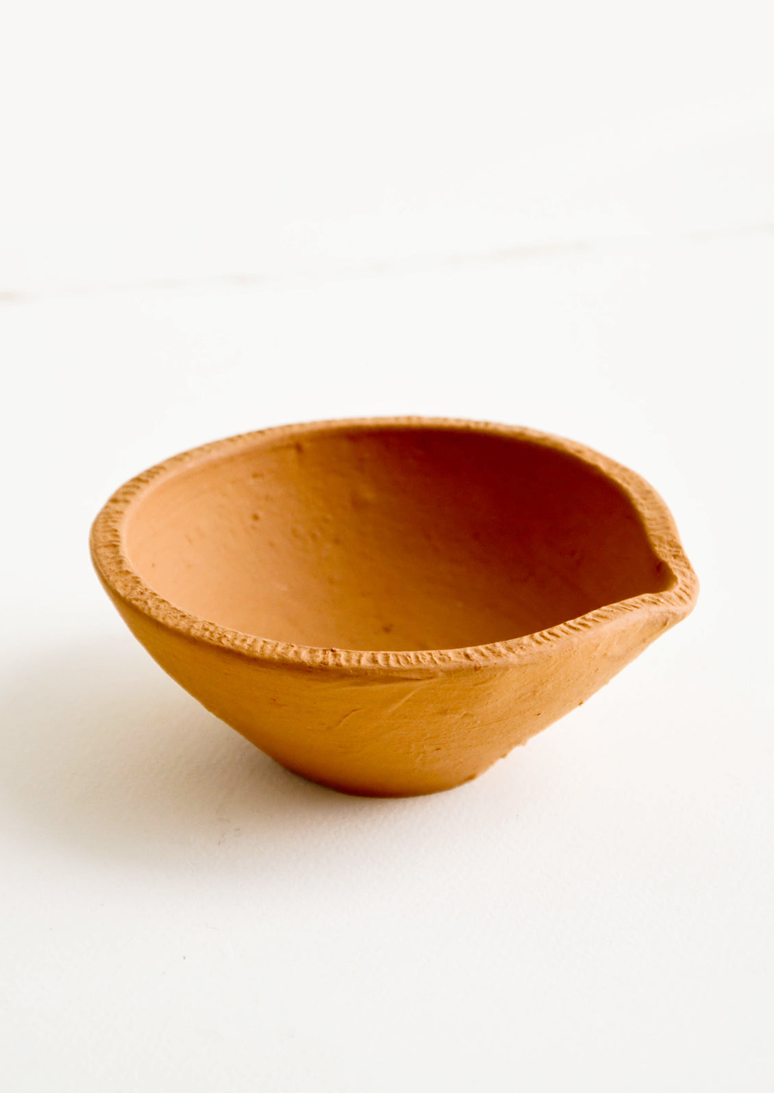 Clay Coyote Mixing Bowl with tiny wire whisk for whipping batter