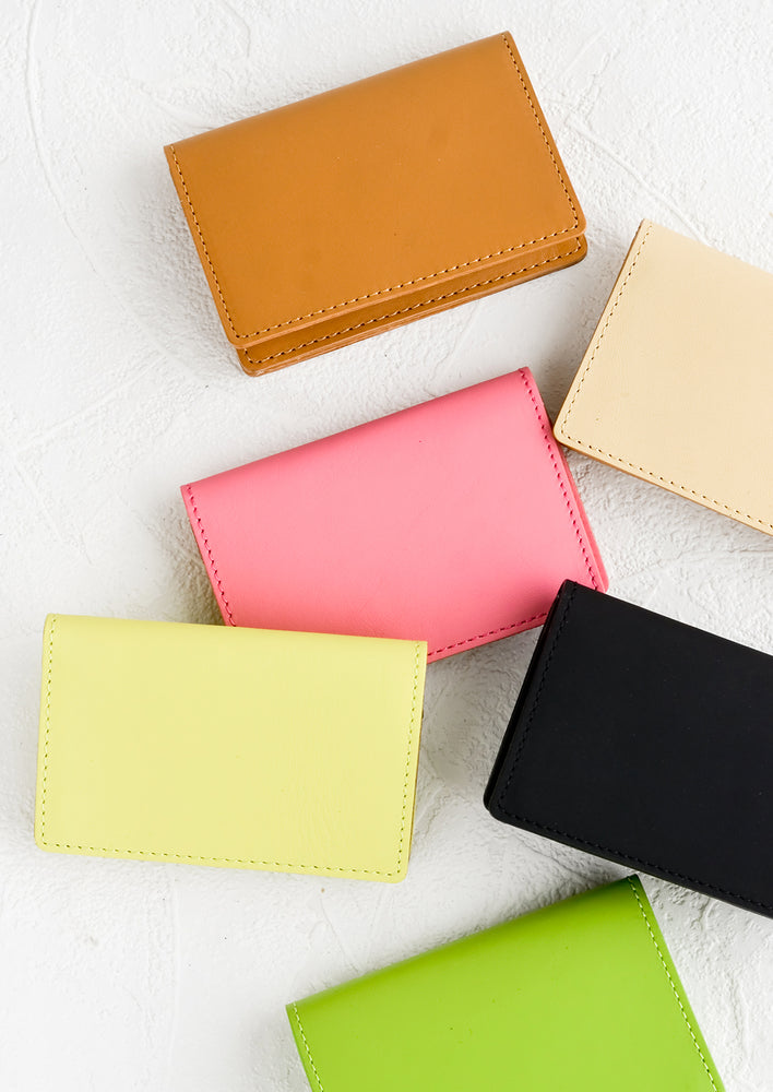 3: Leather card holder wallets in assorted colors.