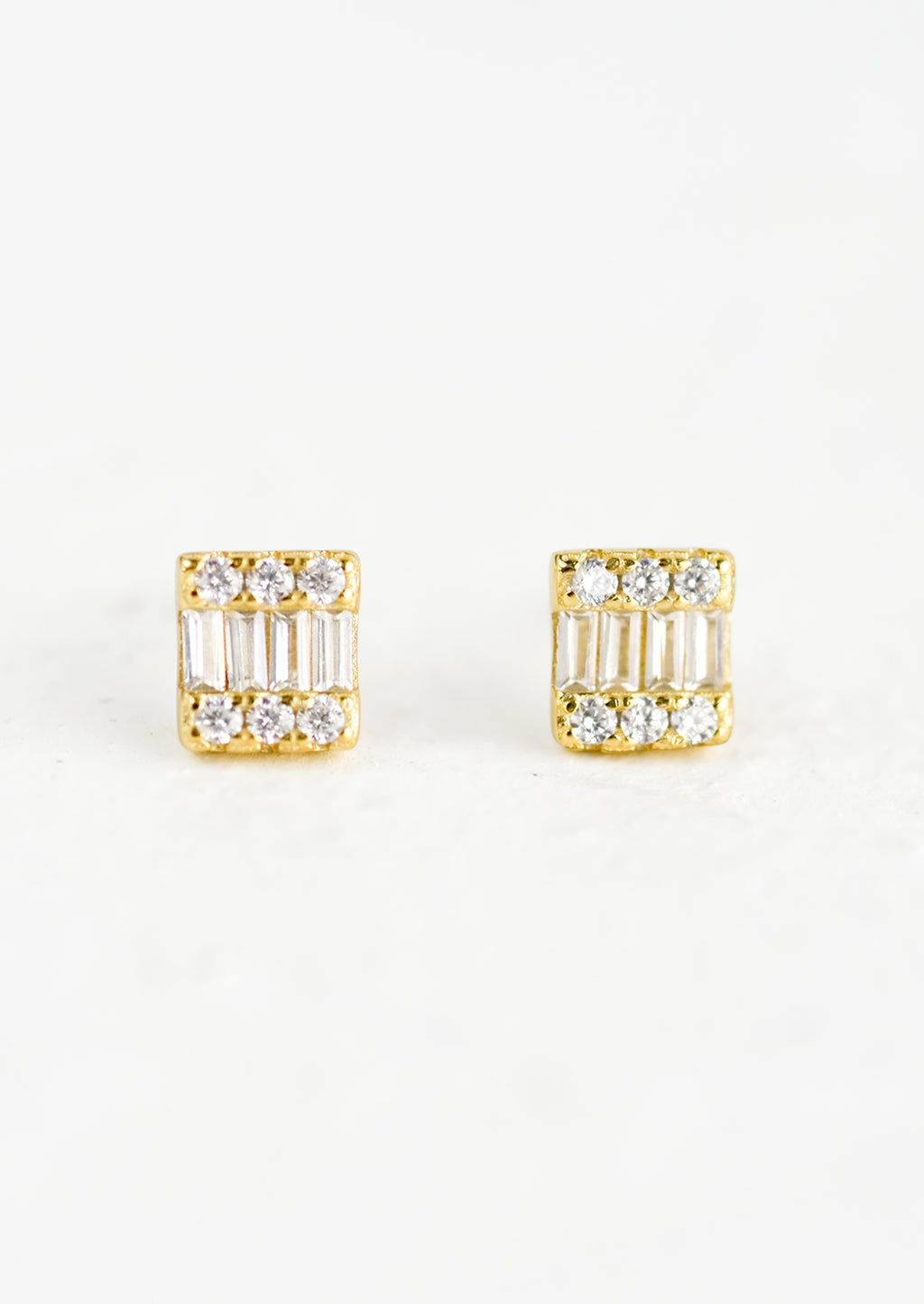 3: Square gold stud earrings with art deco look and sparkling cubic zirconia.