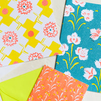 Teal / Neon Peach: A patterned risograph printed card set in yellow, teal and orange.