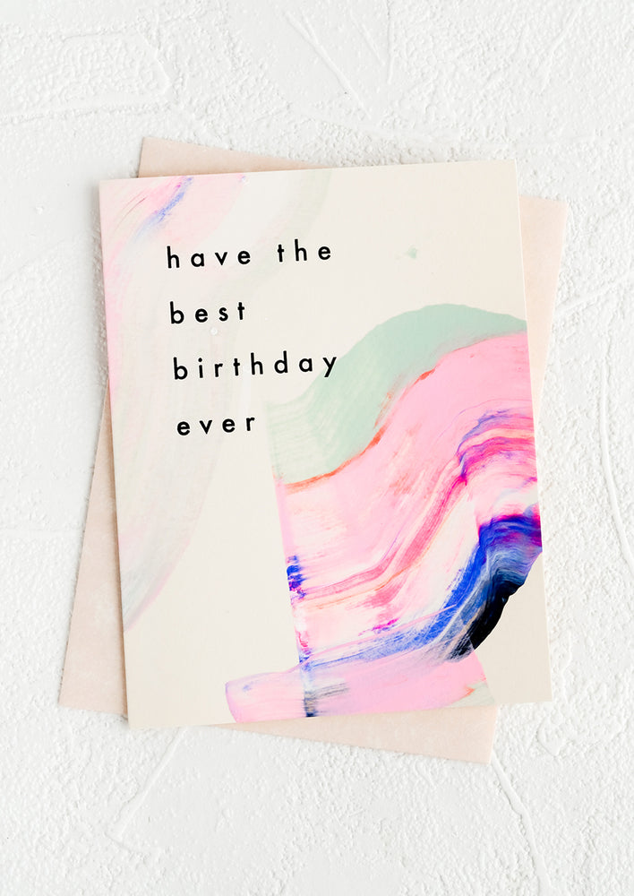 1: A greeting card with hand-painted streak of paint and black lettering reading "Have the best birthday ever"