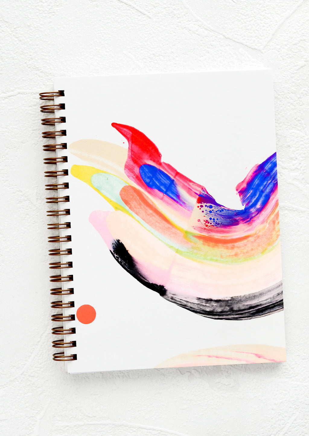 Journal (Ruled): A hardcover, spiral bound notebook with a rainbow swirl, hand-painted cover.