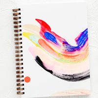 Journal (Ruled): A hardcover, spiral bound notebook with a rainbow swirl, hand-painted cover.