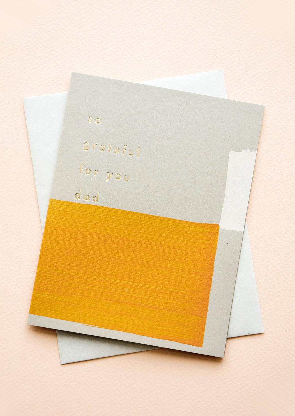 1: Greeting card with hand-painted square shapes in mustard and white, gold text reads "So grateful for you dad"
