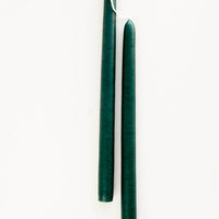 Emerald: A pair of taper candles in emerald green.