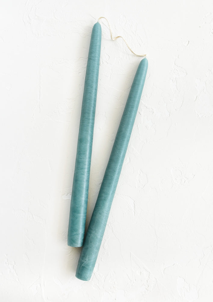 Pair of taper candles in aquamarine