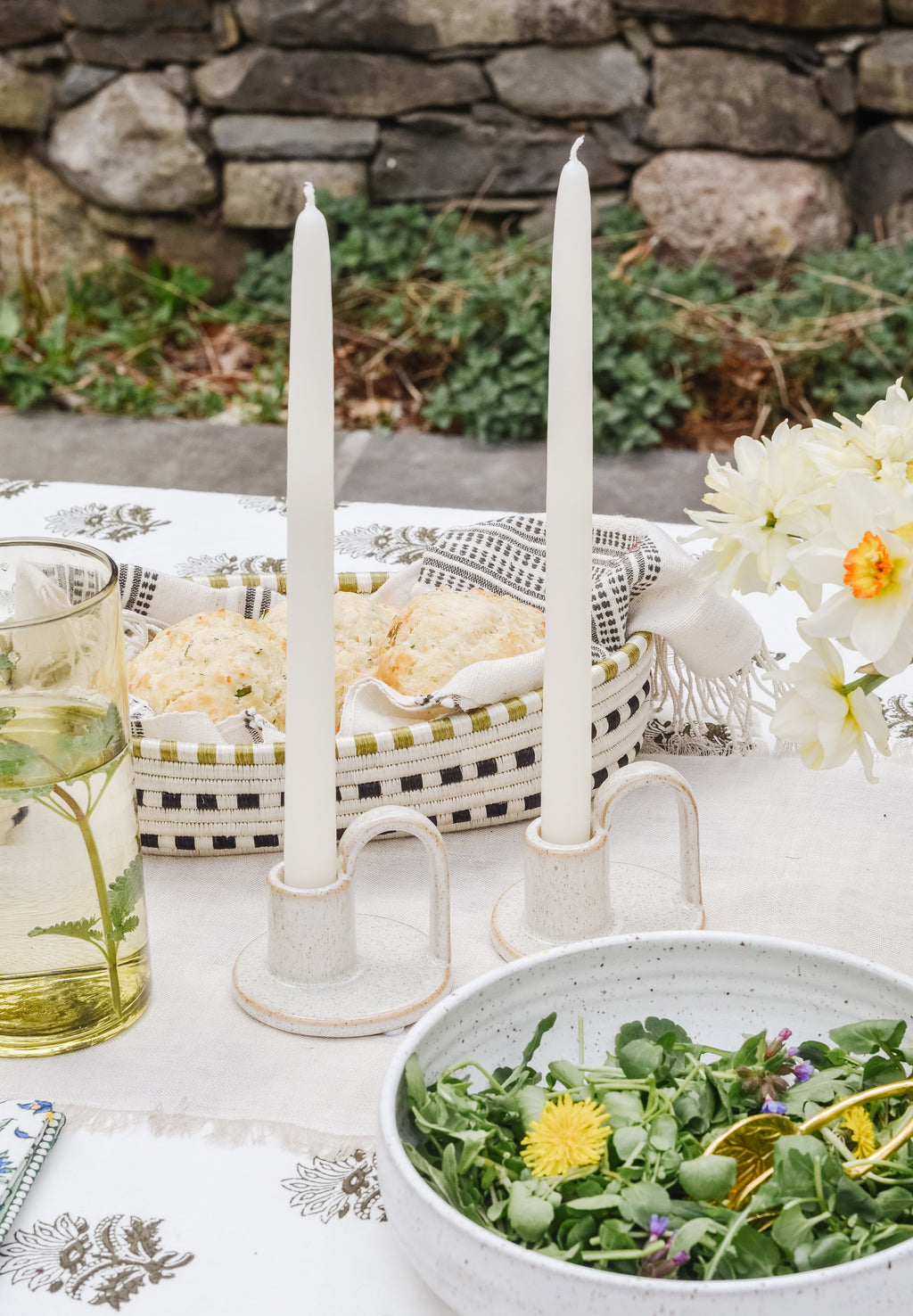 Shell White: Taper candles on a tabletop scene.