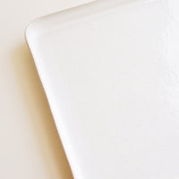 2: Detail of Square Ceramic Tray with Lipped Edge in Ivory.