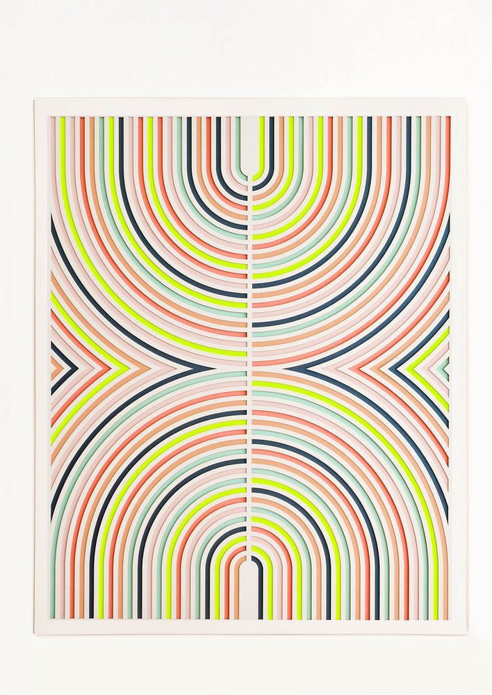 1: Lasercut artwork featuring mirrored half-arcs in a neon color palette