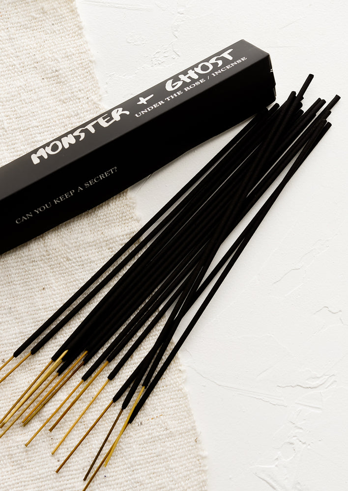 Charcoal stick incense with black box.