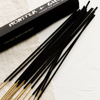 2: Charcoal stick incense with black box.