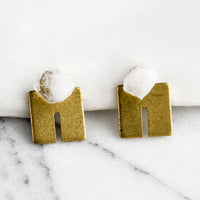 Quartz: A pair of squared U shaped brass studs with raw quartz gemstone post.