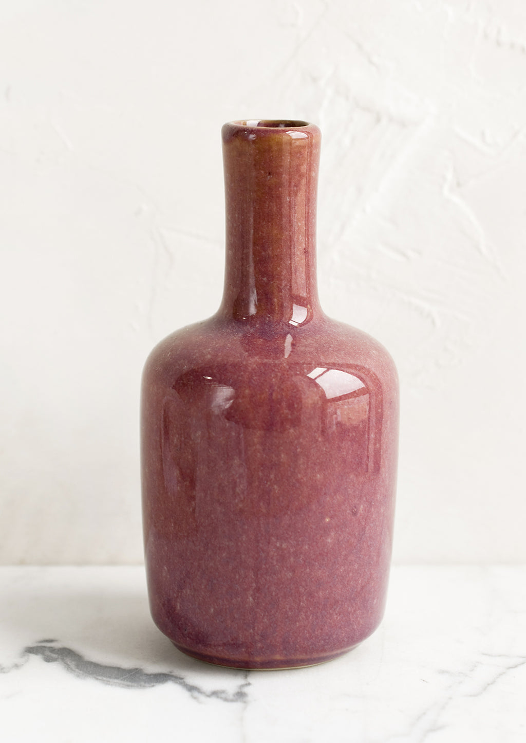 Tall / Elderberry: A ceramic bud vase in tall shape, elderberry color.