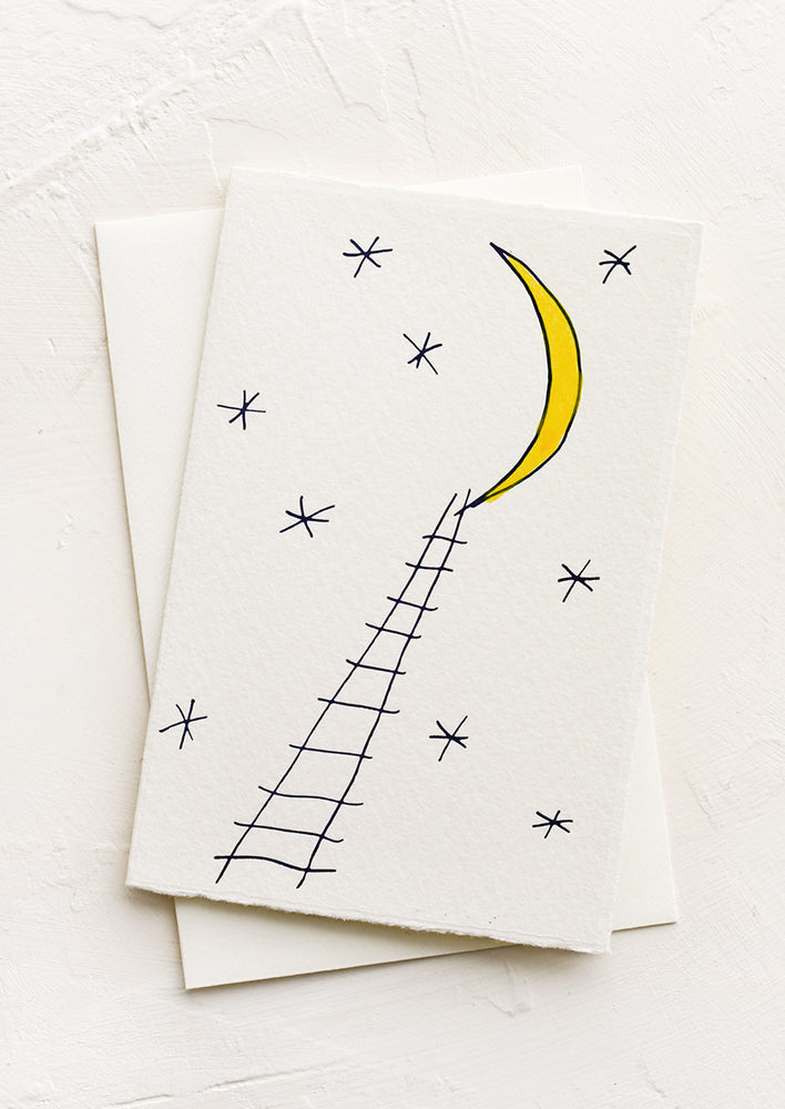 A greeting card featuring drawing of ladder leading to moon.