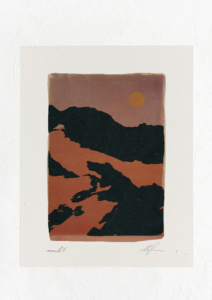 1: An art print of a dark canyon image at night with moon.