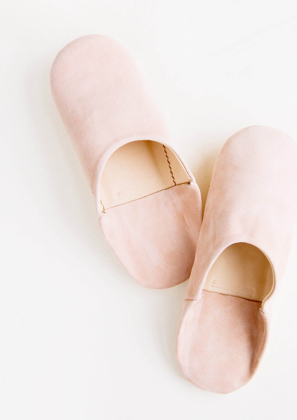 US 5-6 / Blush: Pair of suede house slippers in blush pink