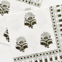 1: A pair of white napkins with block printed motif in moss green.