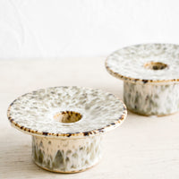 1: Short ceramic taper candle holders with saucer-like top in speckled reactive glaze