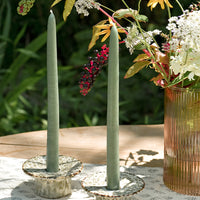 3: Short ceramic taper candle holders with saucer-like top in speckled reactive glaze