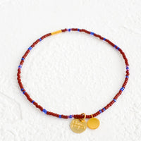 Wine / Cobalt: Seed bead bracelet in wine and blue with brass accents