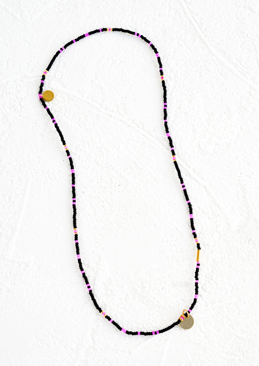 Black / Neon Pink: A seed bead choker necklace in black and neon pink beads.