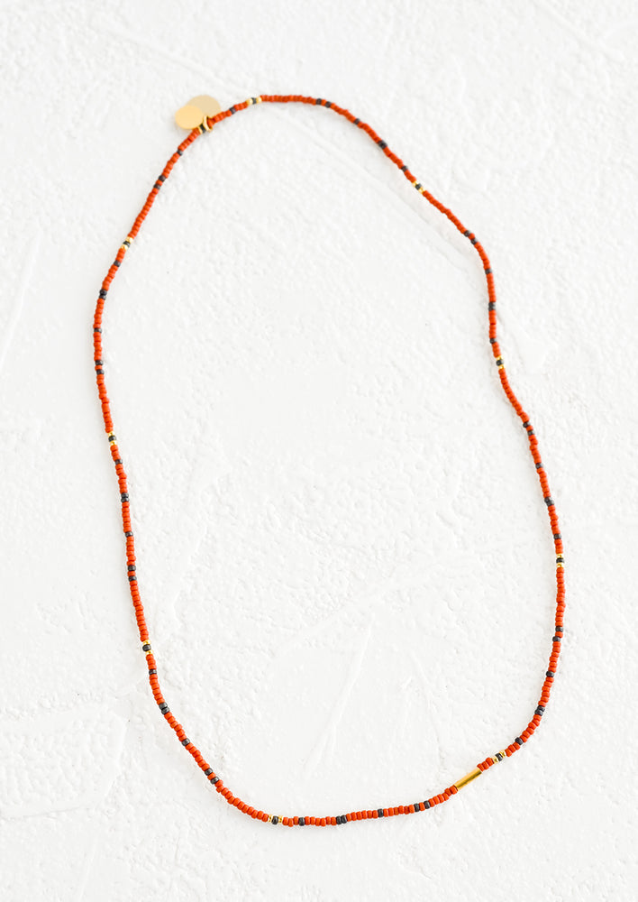 Rust / Charcoal: A seed bead choker necklace in rust and charcoal.