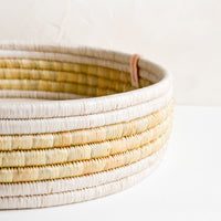 2: A tray made from woven seagrass.