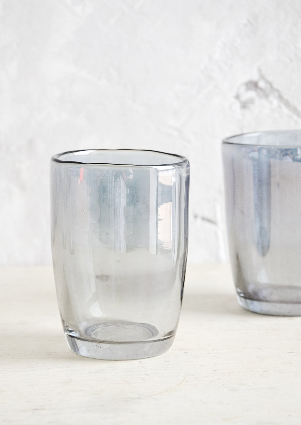Smoke: Clear glass tumblers with grey tint and subtle metallic finish