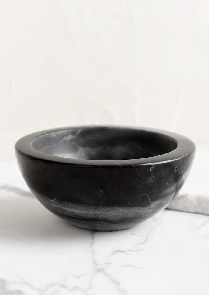 A small black marble bowl.