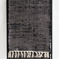 1: A black and white chindi weave table runner.
