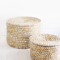 3: Small and large sizes of round, lidded seagrass baskets
