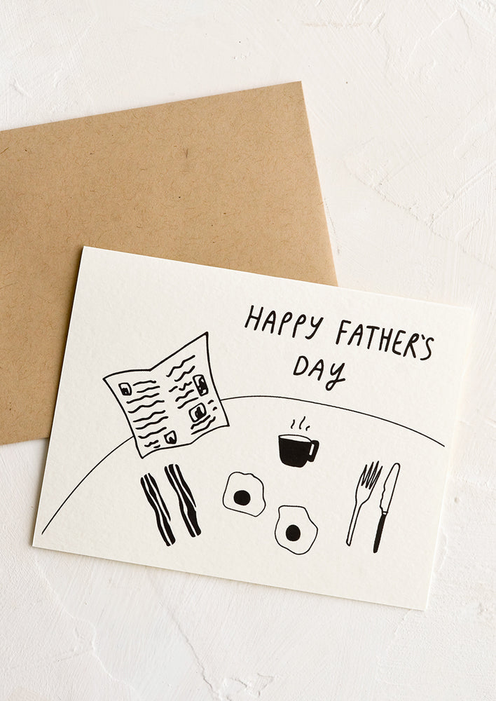 An illustrated father's day card in black and white.