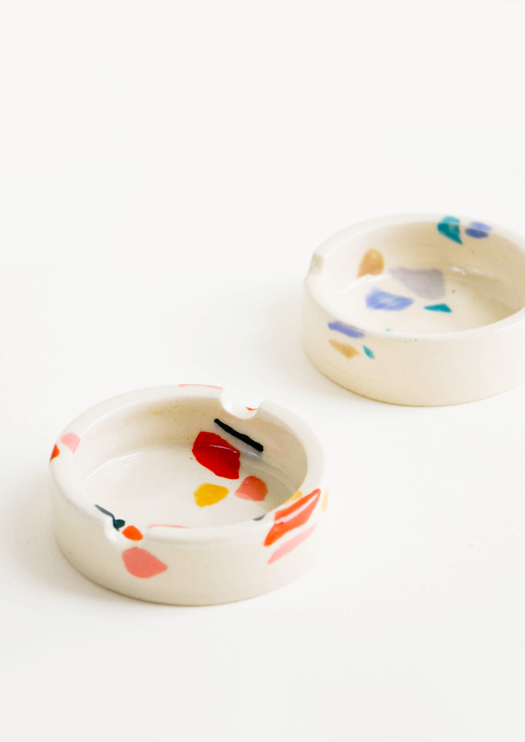 2: Ceramic ashtray with allover hand painted terrazzo pattern in a variety of colors