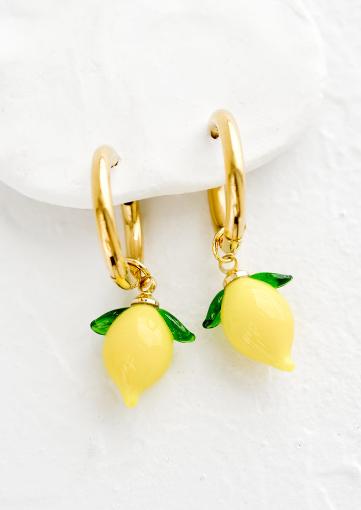 1: Gold huggie hoop earrings with glass lemon charms.