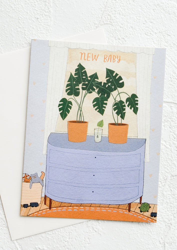 1: A greeting card with illustration of a sprouting plant in between two larger plants, inside a nursery.