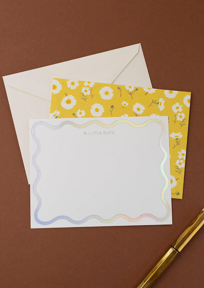 A daisy printed notecard set.