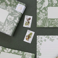 2: A green and white stationery scene.