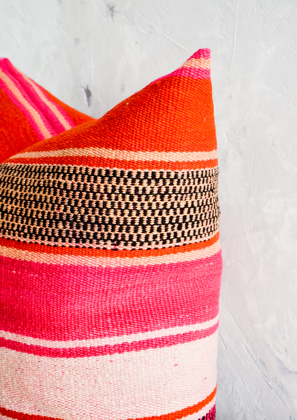 2: Throw pillow made from vintage striped wool in vibrant pink, orange and peach