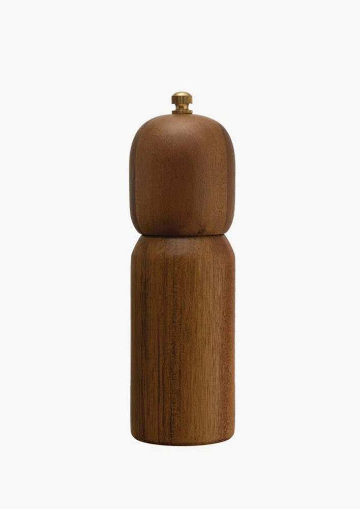3: A wooden pepper mill with rounded shape.
