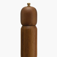 3: A wooden pepper mill with rounded shape.