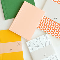Large / Forest Green / Ruled: A group of colorful writing notebooks in assorted sizes and colors.