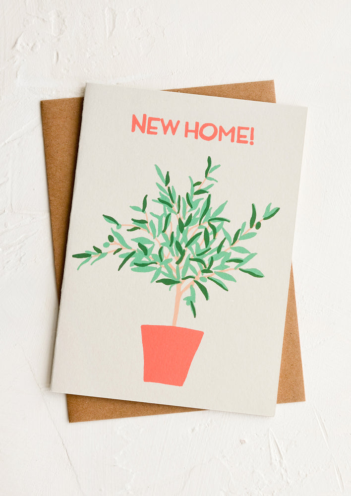 1: A greeting card with screen printed olive tree and "NEW HOME!" in red lettering.