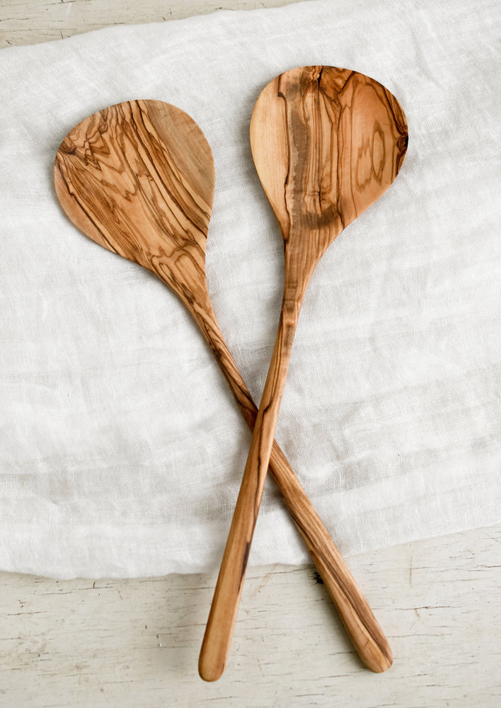 A pair of natural olivewood salad servers.