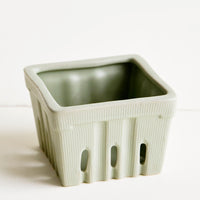 Sage: Ceramic basket in the style of disposable berry basket, shown in sage green