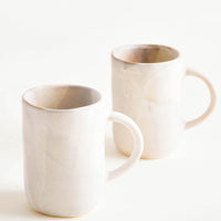 Stonewash: Ceramic mugs with handle, shown in matte watercolor glaze.