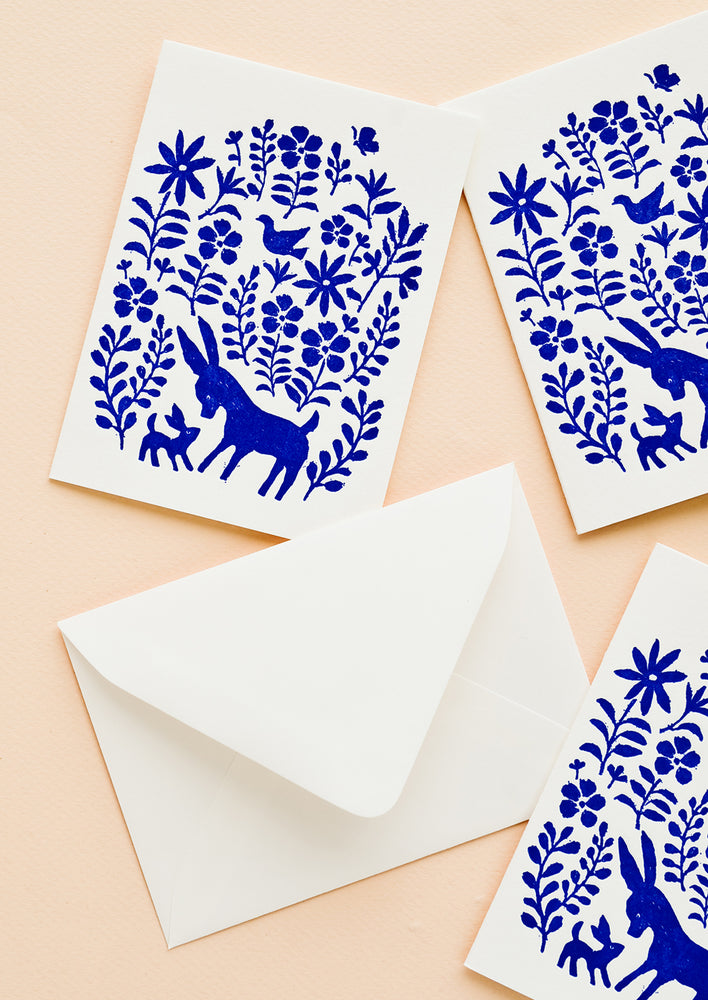Three matching greeting cards with blue otomi printed fronts, with white envelope.