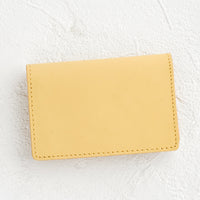 Vanilla: A small leather cardholder wallet in vanilla.