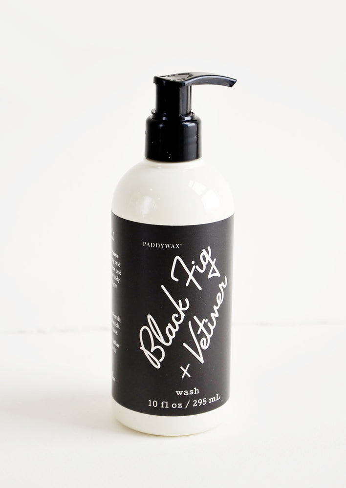 Liquid soap packaged in ivory and black pump bottles with black and white label
