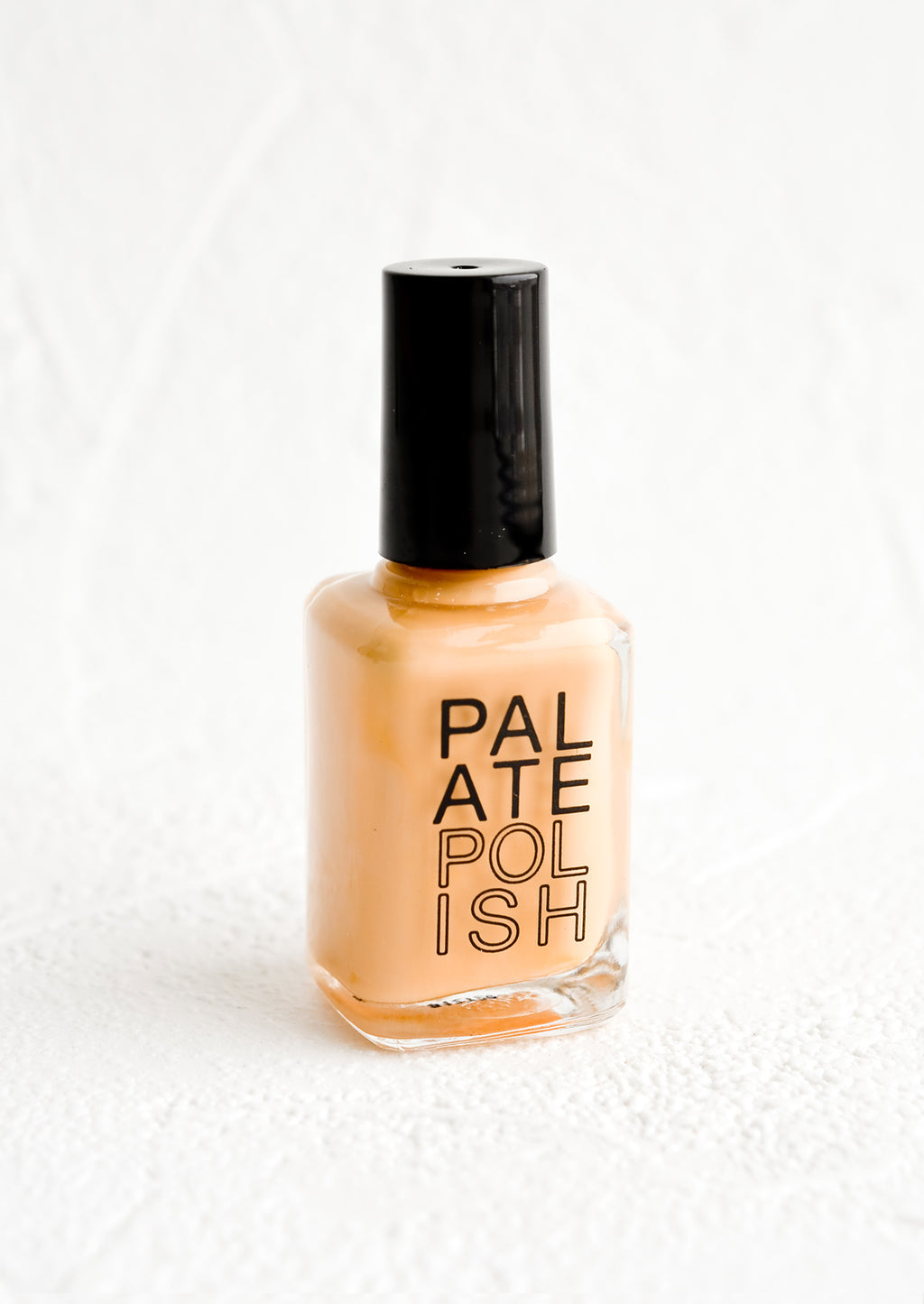 Chai Latte: A bottle of nail polish in peach.